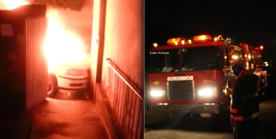 Carro pega fogo em garagem na zona oeste