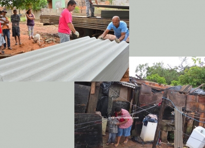 Moradores que tiveram casas atingidas por temporal recebem telhas