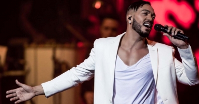 Belo cobra até R$ 600 para tirar fotos com fãs