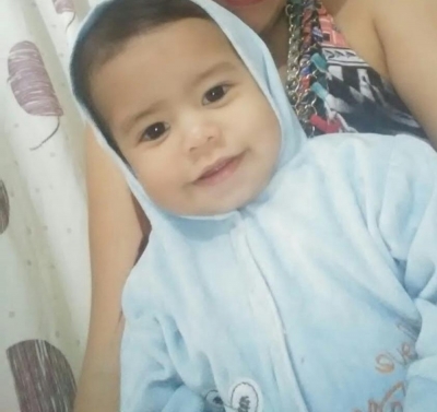 Bebê levado morto a hospital com marcas de soco e mordida é enterrado na região