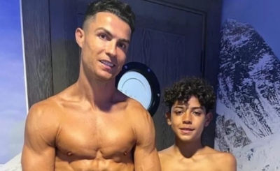 Aos 11 anos, filho de Cristiano Ronaldo exibe músculos ao lado do pai