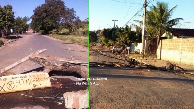 Moradores cobram recuperação do asfalto e decidem interditar rua na zona Norte