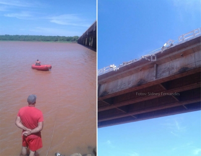 Caminhão cai em rio na região. Equipes buscam motorista