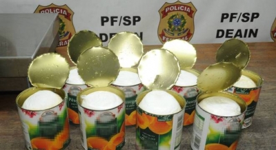 Brasileiro é preso ao tentar levar cocaína em latas de pêssego para o exterior