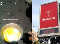 É O CALOR... Homem frita ovo no asfalto.