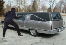 Carro fúnebre: roubo